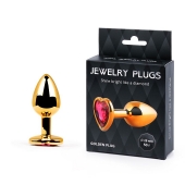 Золотистая анальная пробка с малиновым кристаллом-сердечком - 7 см. - Anal Jewelry Plug - купить с доставкой в Нижневартовске